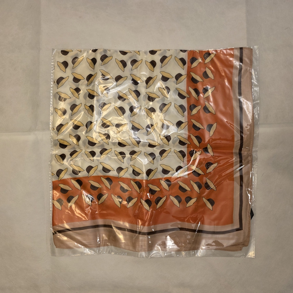 Chic Patterned Scarf in Orange and Cream